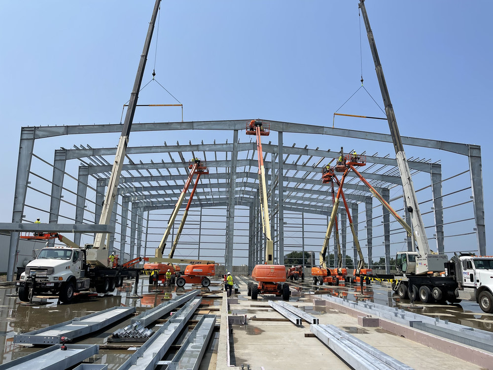Pro X Builders crew erecting steel frame