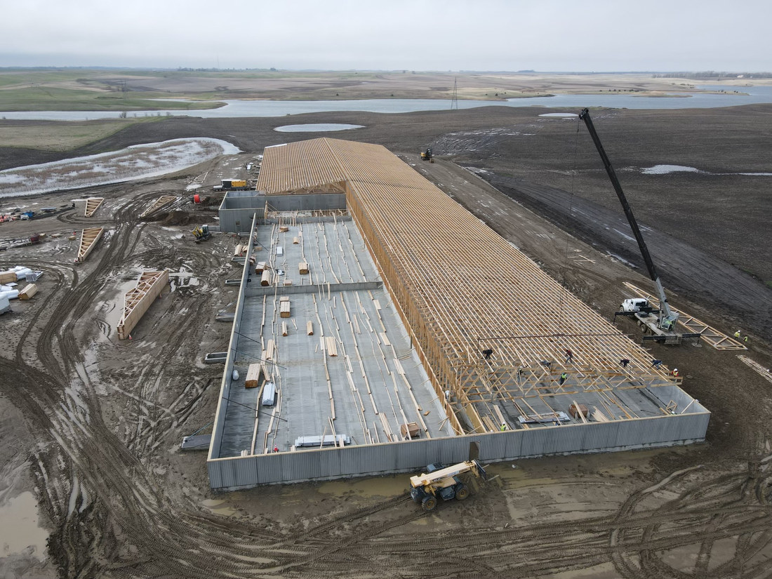 Aerial view of the wood roof truss framing on a South Dakota ag building